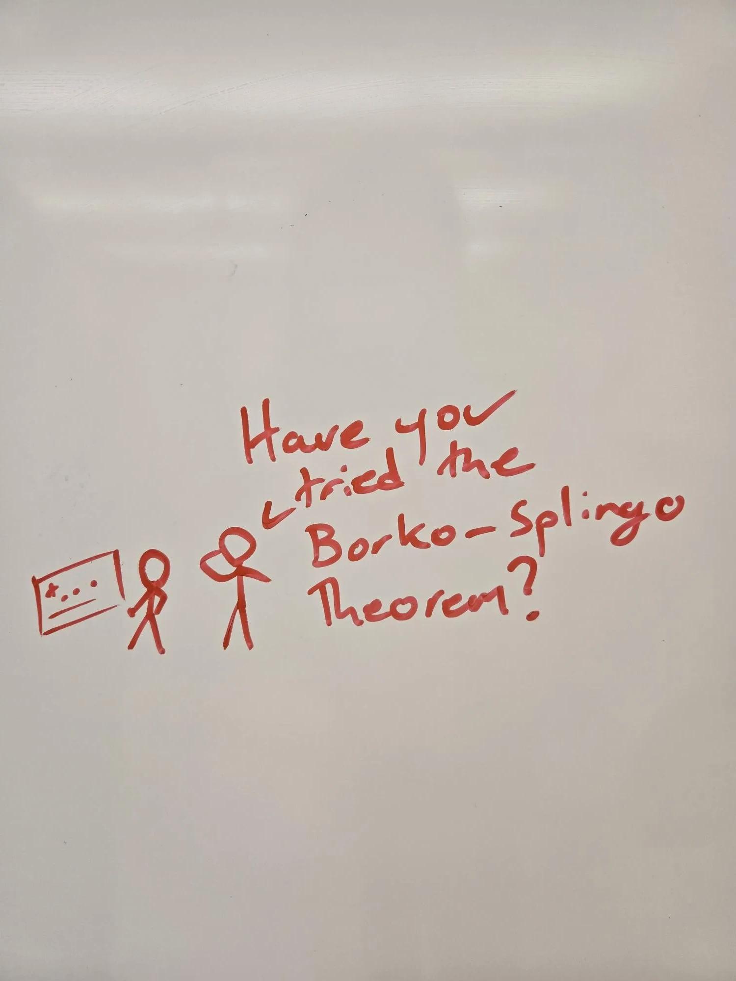Two mathematicians discuss applying the Borko-Splingo Theorem.