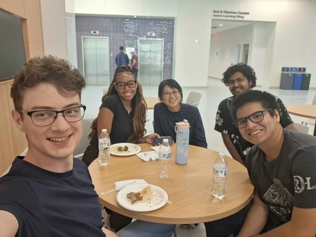 Greg takes a selfie with the group