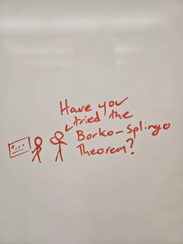 Two mathematicians discuss applying the Borko-Splingo Theorem.